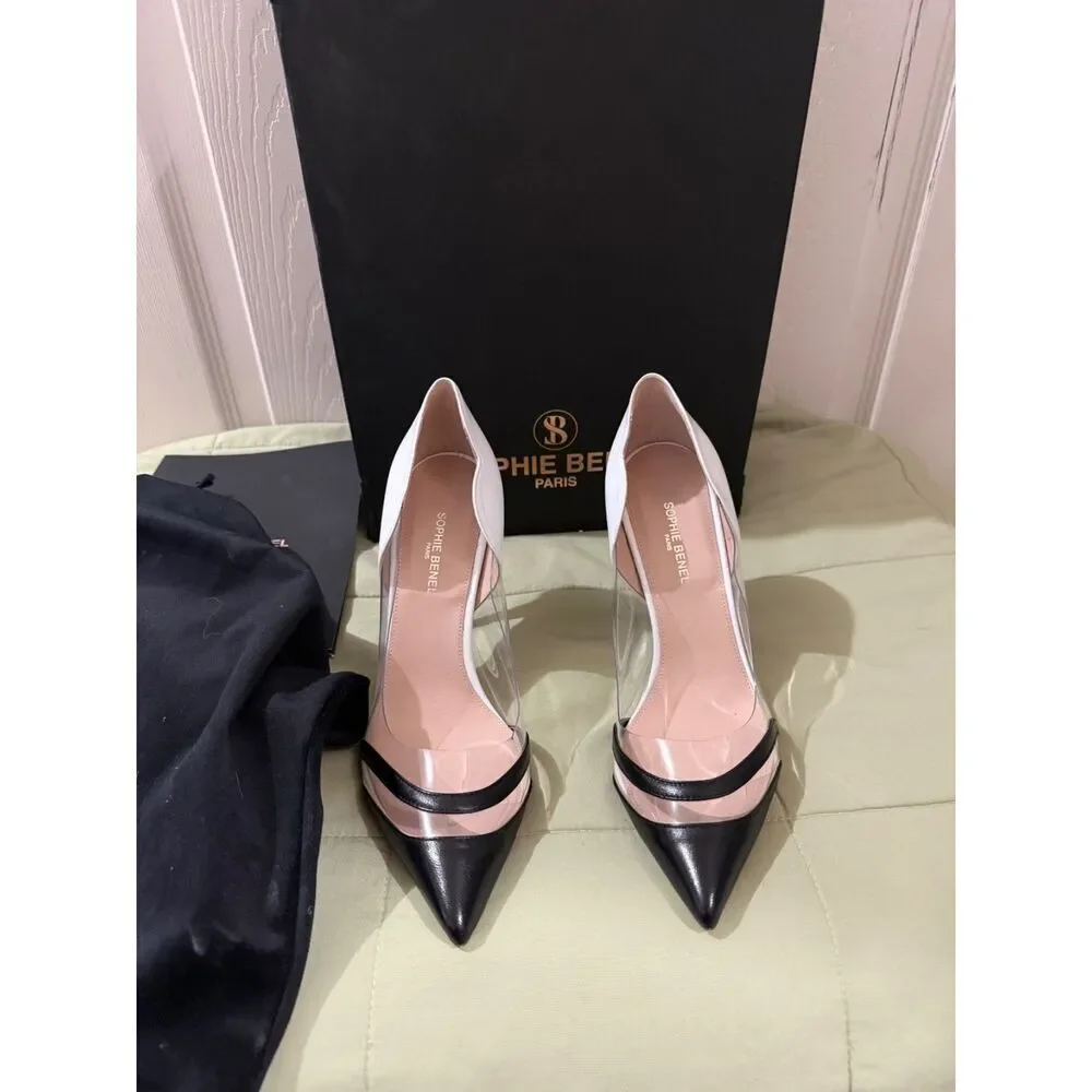 Sophie Benel Paris NIHA white and black pointed-toe pumps with clear PVC sides.